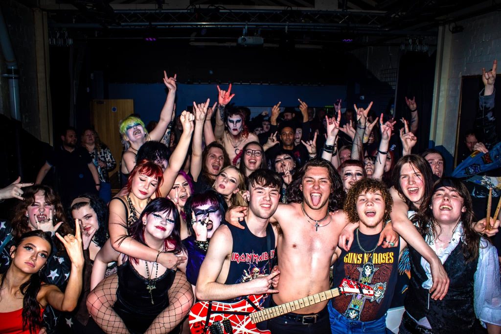 FRACXURA live crowd photo with fans and band members
