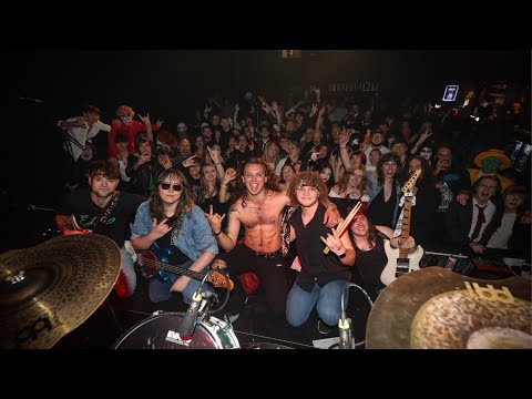 FRACXURA video still with band and crowd